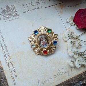 Religious Gold Brooch with Multicolor Gemstones